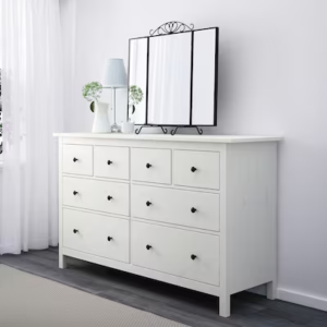 A chest of drawers, tallboy, or dresser