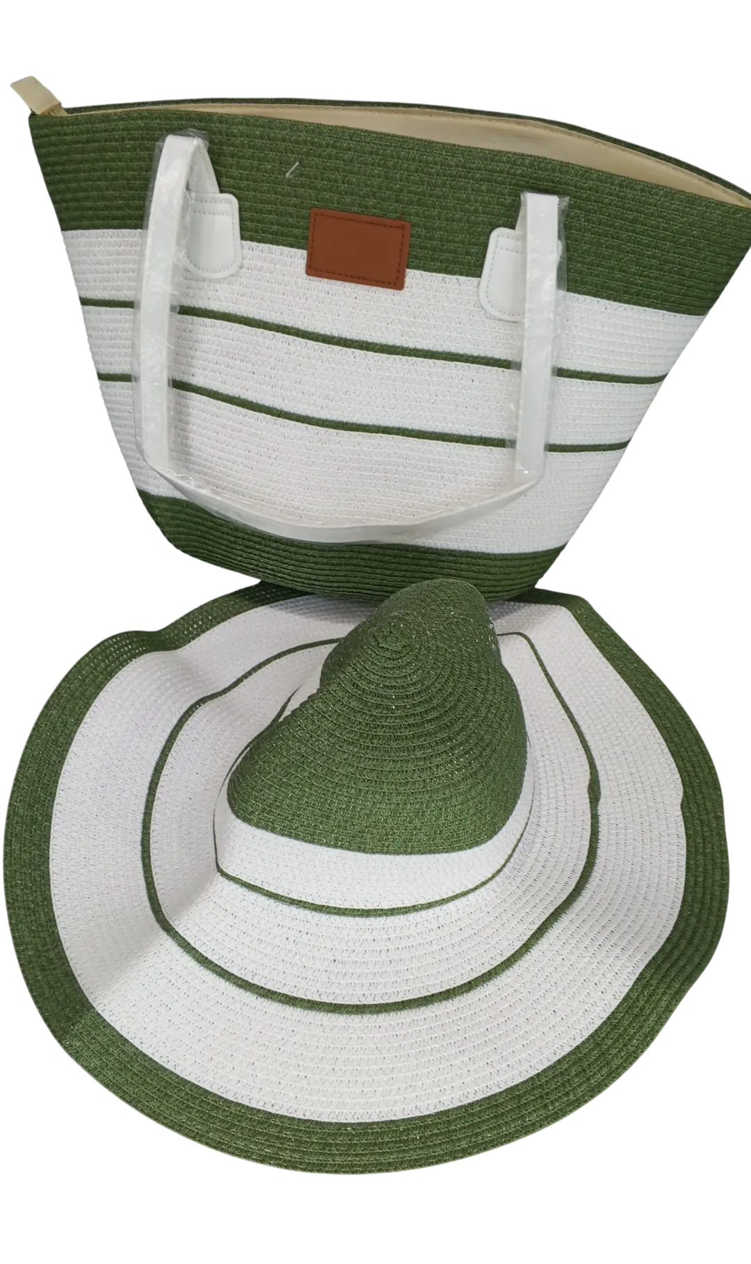 Beach bag with green and white woven stripes and matching wide-brim hat.