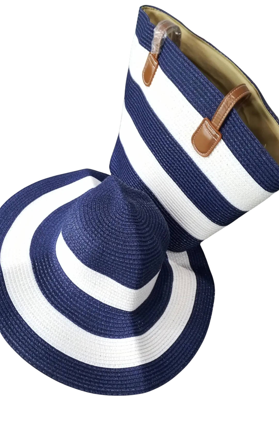 Beach bag with navy blue and white woven stripes and matching wide-brim hat.
