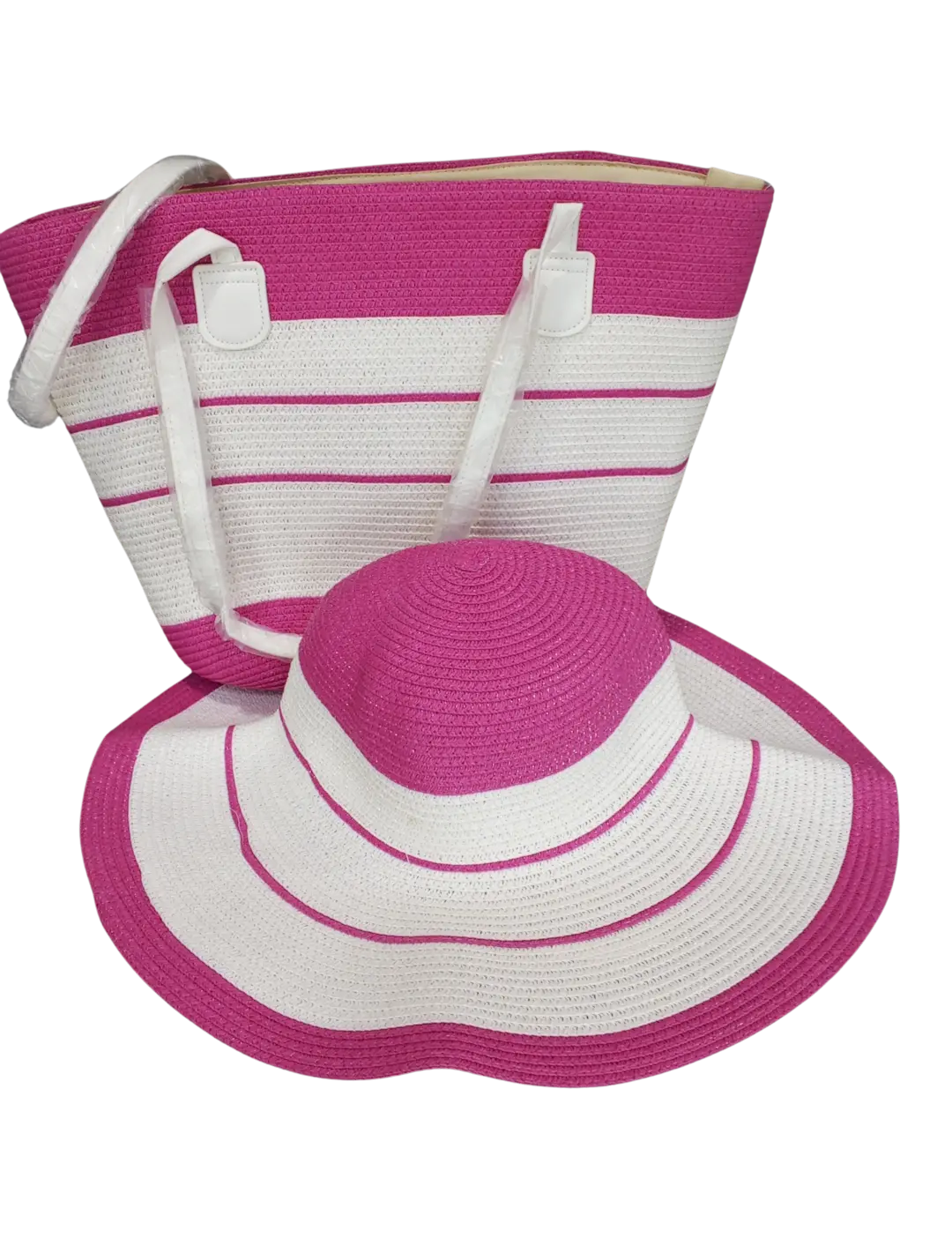 Beach bag with pink and white woven stripes and matching floppy hat.