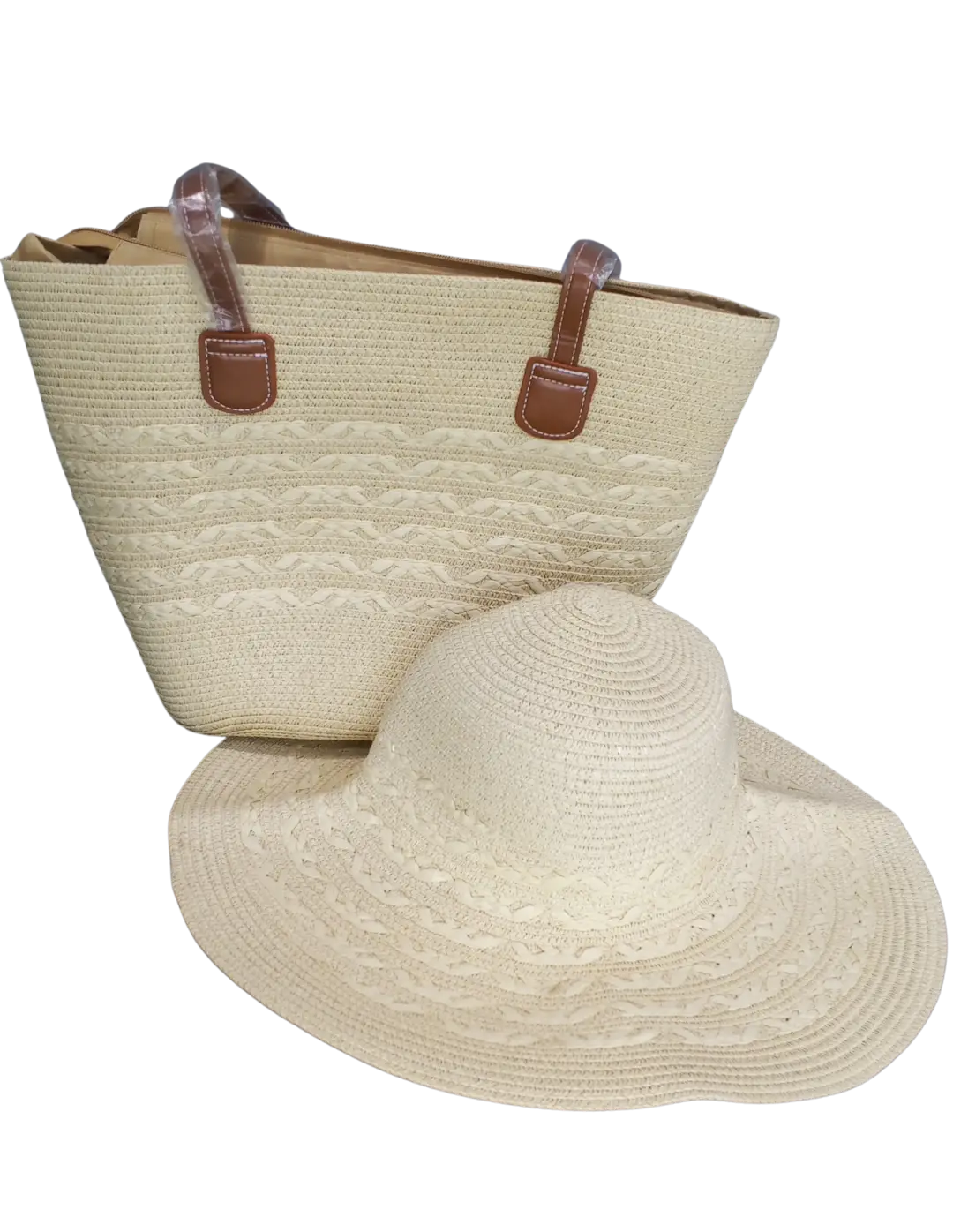 Classic beige woven straw beach bag with decorative textured patterns and matching hat.