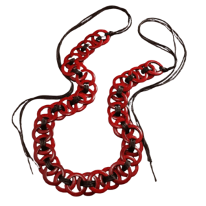 Handmade African belt with red wooden rings linked by cords.