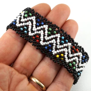 Handcrafted Masaai bracelet with vibrant multicolored beads in traditional patterns.
