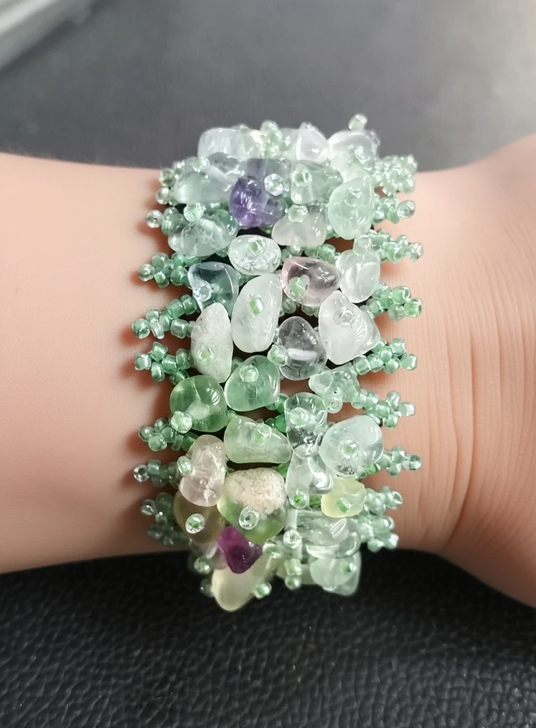 Crystal bracelet with light green beads.