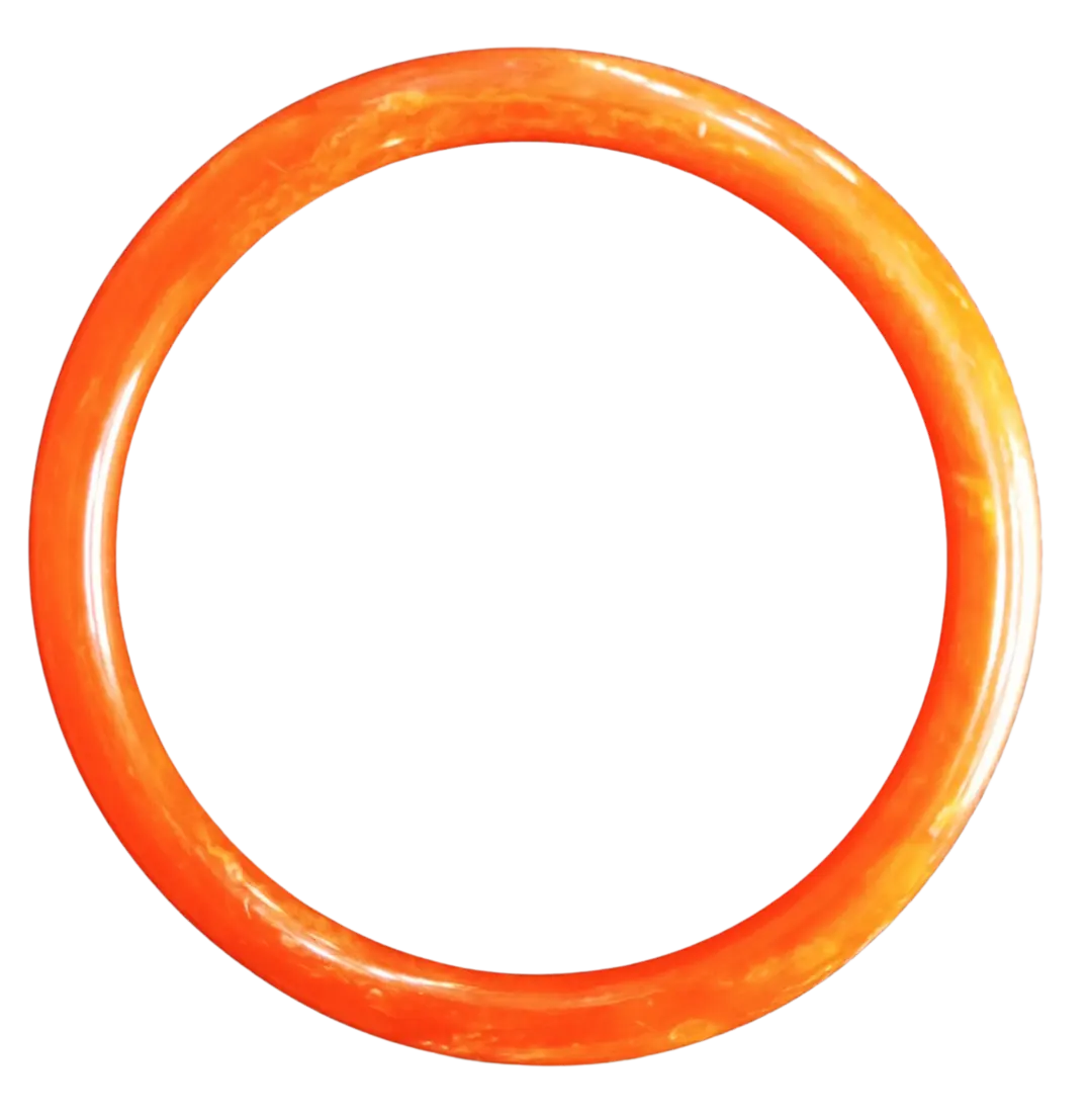Orange jade bangle with translucent marbled tones ranging from deep orange to yellow