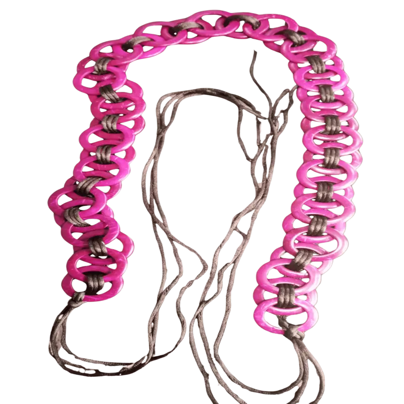 Bohemian African belt with light pink wooden rings and cord ties.