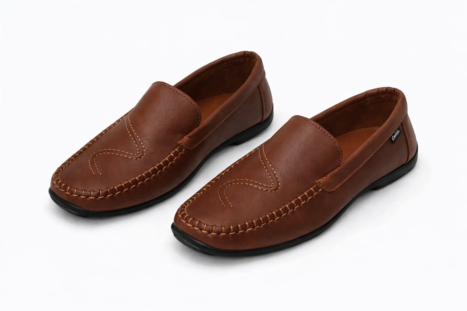 Brown leather casual loafers with decorative stitching, black sole, slip‑on footwear Nairobi Kenya.
