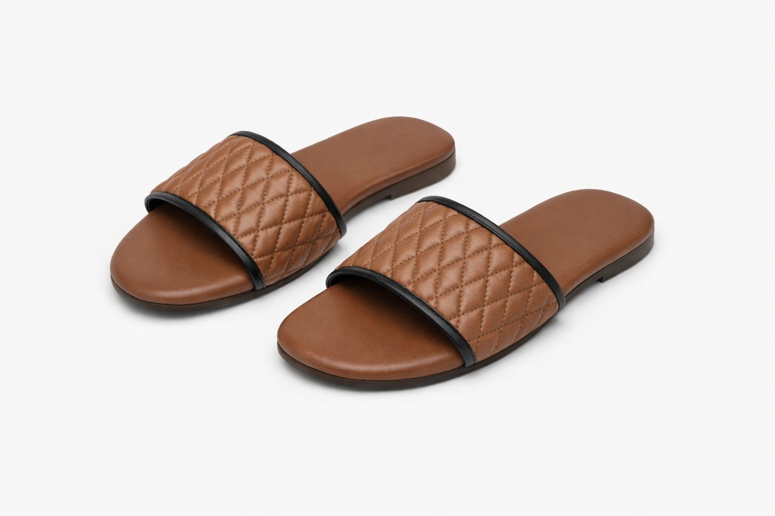 Brown quilted women’s slide sandals with diamond‑pattern straps, black trim, casual summer footwear in Nairobi Kenya.