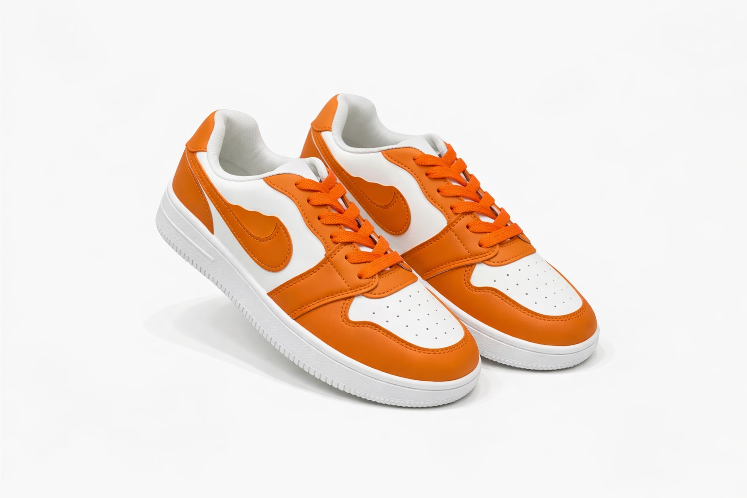 Casual sports sneakers orange overlays with white base, low‑top athletic shoes Nairobi Kenya.