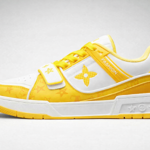 Yellow and white sneaker with floral motif, yellow strap, and 'FASHION' branding near laces