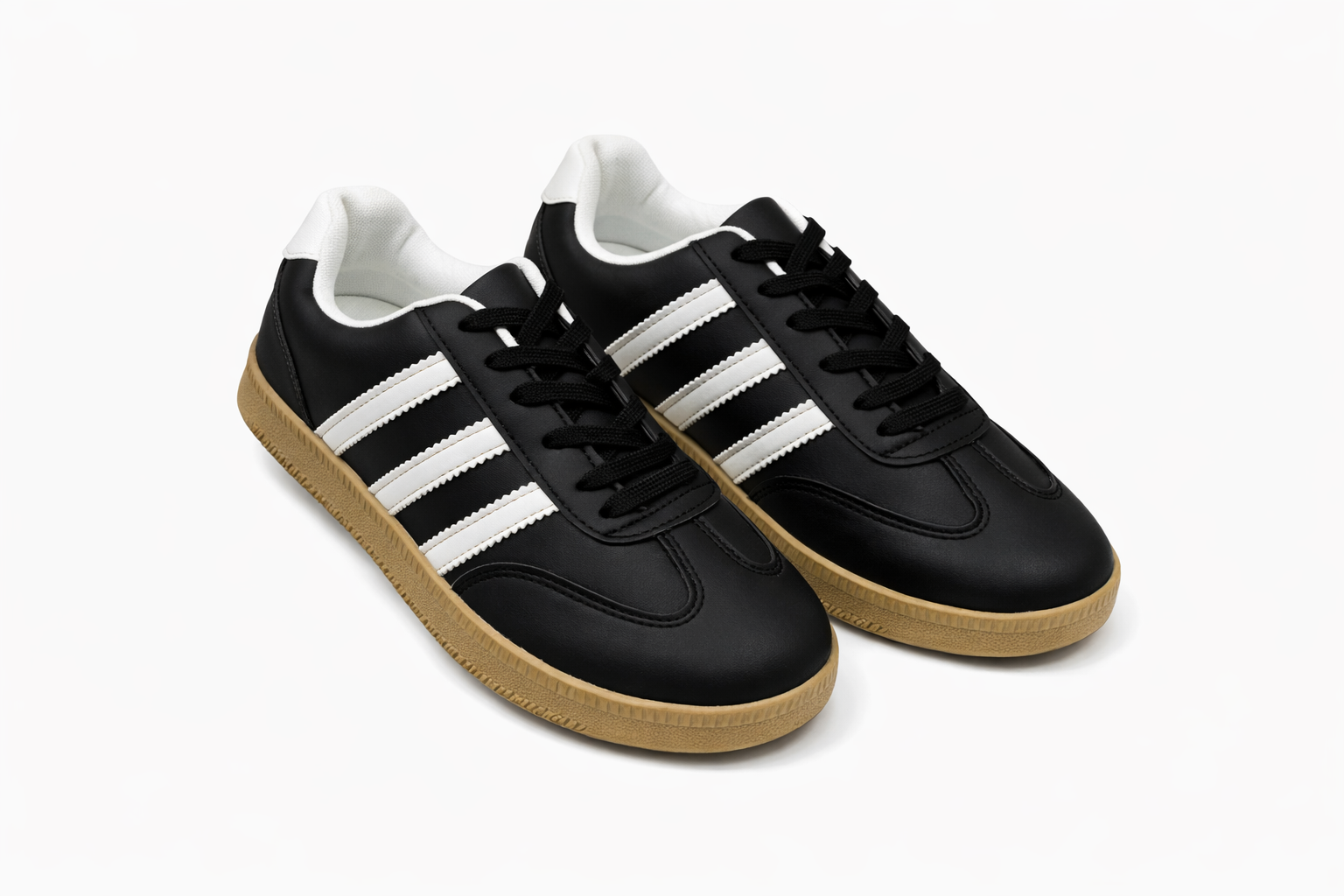 Black sneakers with white stripes, black laces, and gum sole.