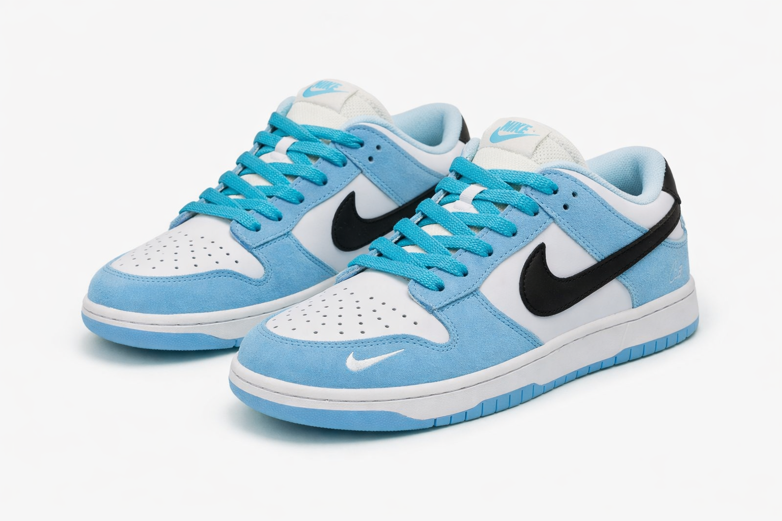 SB Dunk Low sneakers light blue suede overlays, white leather panels, black swoosh, bright blue laces, skate shoes in Nairobi Kenya.