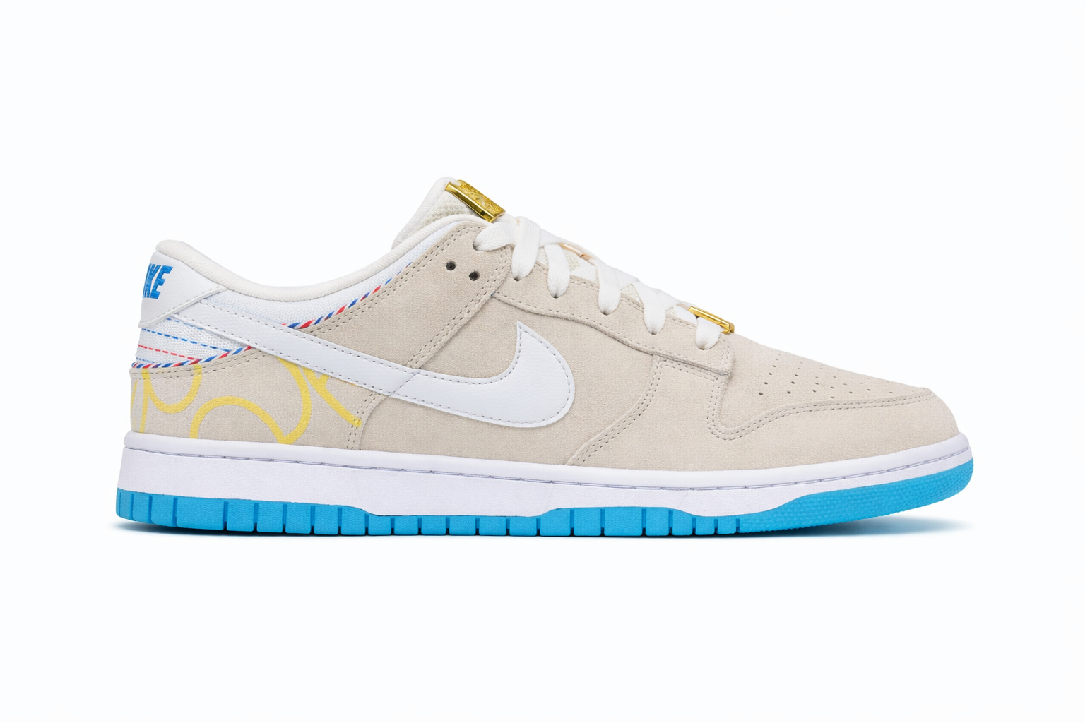 Nike Dunk Low SE Barber Shop Grey sneaker with beige suede upper, white swoosh, white laces with gold tips, blue outsole, and striped detailing near heel Nairobi Kenya.