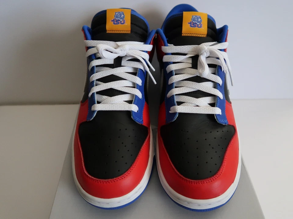 Nike Dunk Low Tennessee State University Sneakers with TSU Tiger Logo Nairobi Kenya Nike Dunk Low Tennessee State University sneakers with red, blue, black, and white panels, white swoosh, white laces, and white midsole Nairobi Kenya.