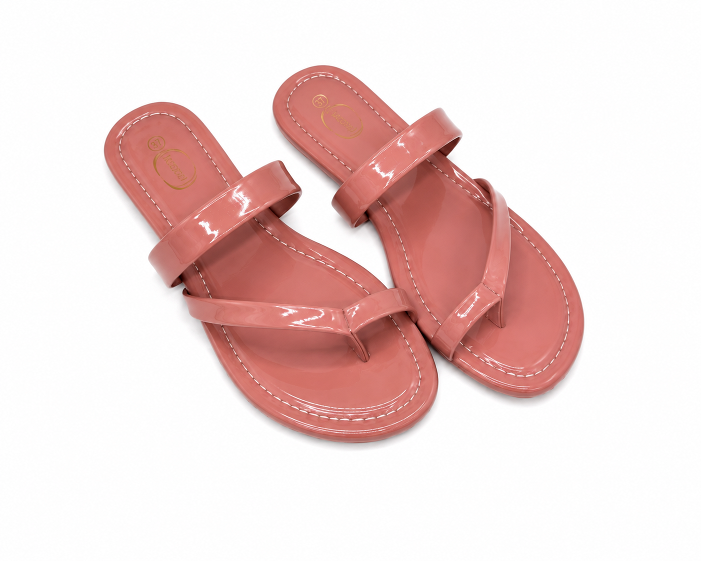 Pink glossy women’s flat sandals with toe strap and wide band, stylish casual footwear in Nairobi Kenya.