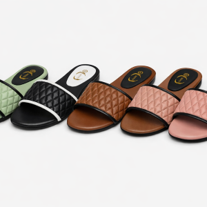 Cover image showing five pairs of quilted women’s slide sandals in Nairobi Kenya. Variants include light green, black with white trim, brown, and two shades of pink. All feature diamond‑pattern quilted straps, flat soles, and gold logo insoles.