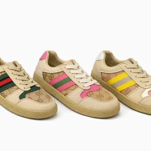 Cover image showing three pairs of beige Samba sneakers side by side. Left pair with green/red stripes and green accents, middle pair with pink/green stripes and pink accents, right pair with yellow/gray stripes and white accents. All feature patterned canvas panels, beige laces, and gum soles.