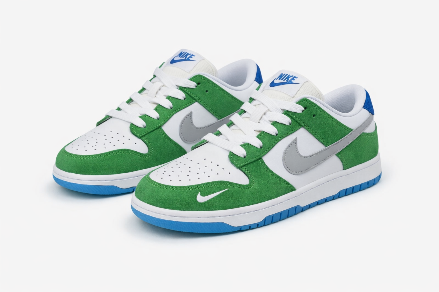SB Dunk Low sneakers green suede overlays, gray swoosh, blue heel tab and outsole, casual sneakers in Nairobi Kenya.