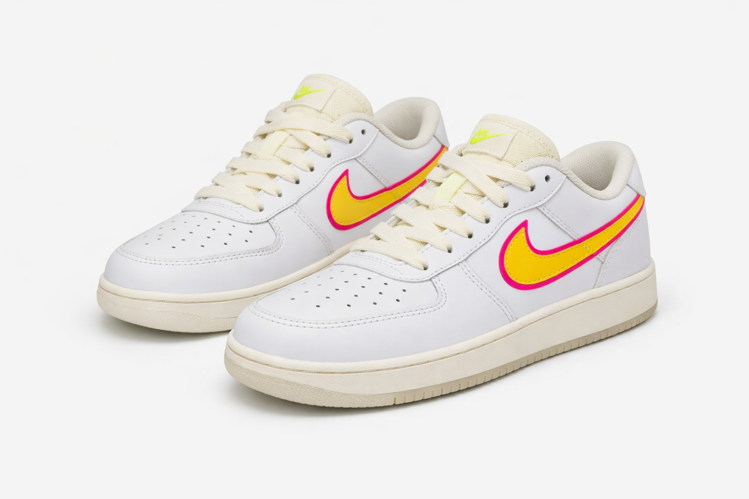 SB Dunk Low sneakers white leather with yellow swoosh outlined pink, cream laces, casual streetwear shoes in Nairobi Kenya.