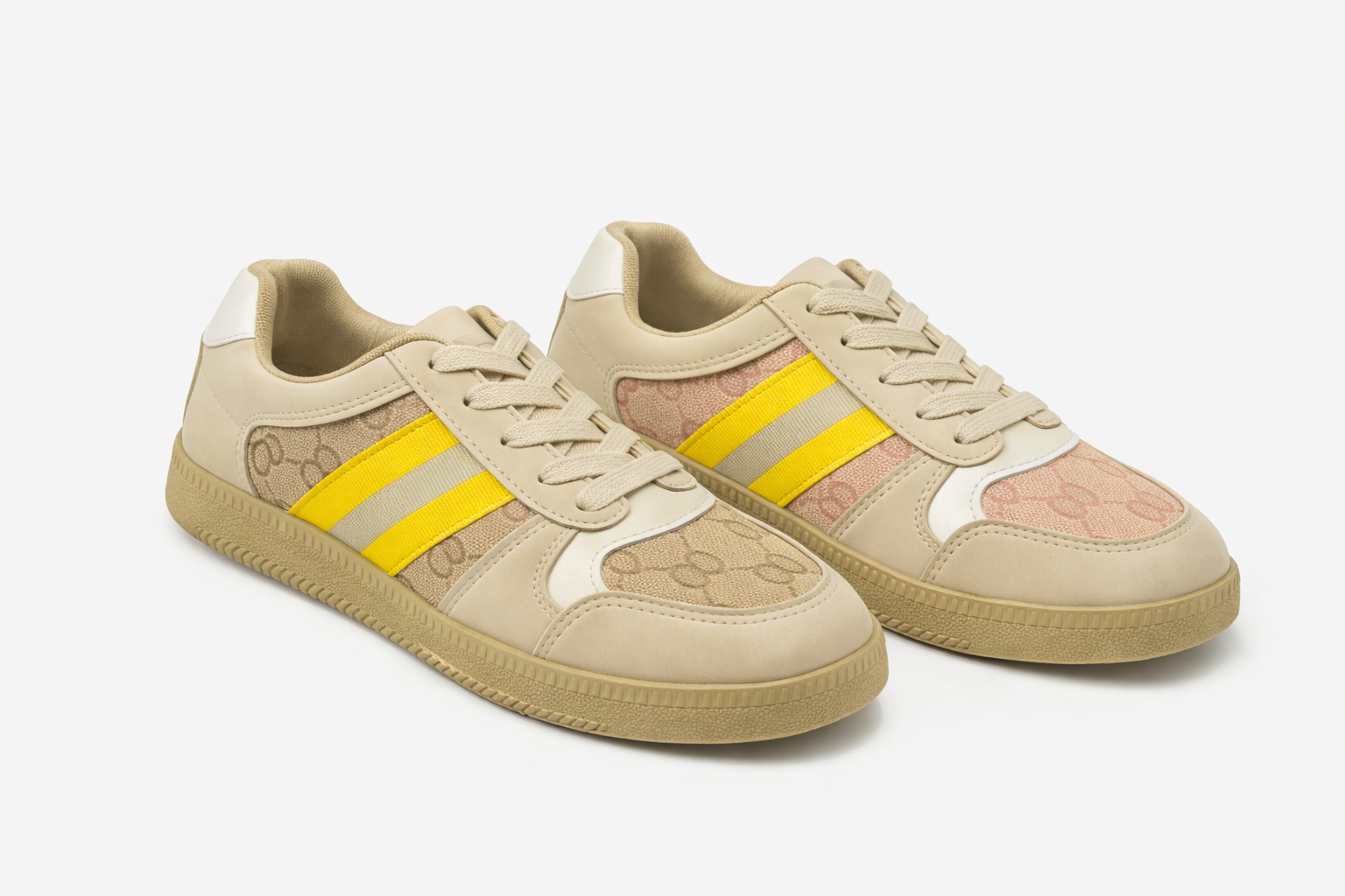 Beige sneakers with patterned fabric panel, yellow and gray side stripes, beige laces, and gum sole.