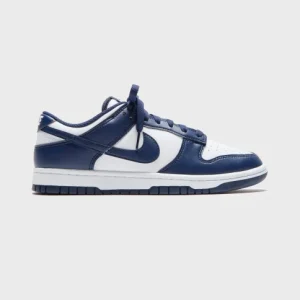 Nike Dunk Low Retro sneakers with white leather base, navy blue overlays, navy swoosh, navy laces, and white midsole Nairobi Kenya.