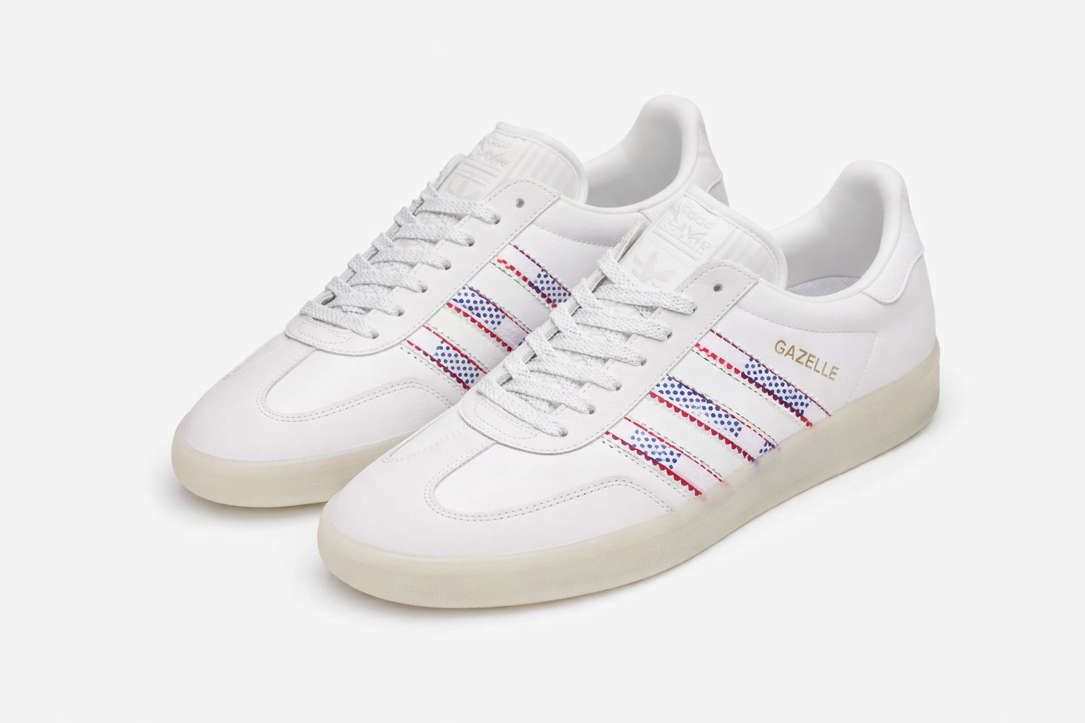 Adidas Gazelle sneakers white leather with red and blue dotted stripes, casual lifestyle shoes Nairobi Kenya.